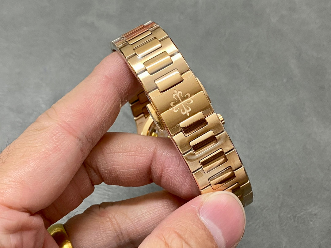 PATEK PHILIPPE NAUTILUS 파텍필립 노틸러스 7118/1300R 로즈 골드 다이얼 큐빅 베젤